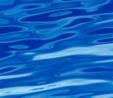 Fine art photograph by Peter Lik depicting rippling azure blue waters in the ocean