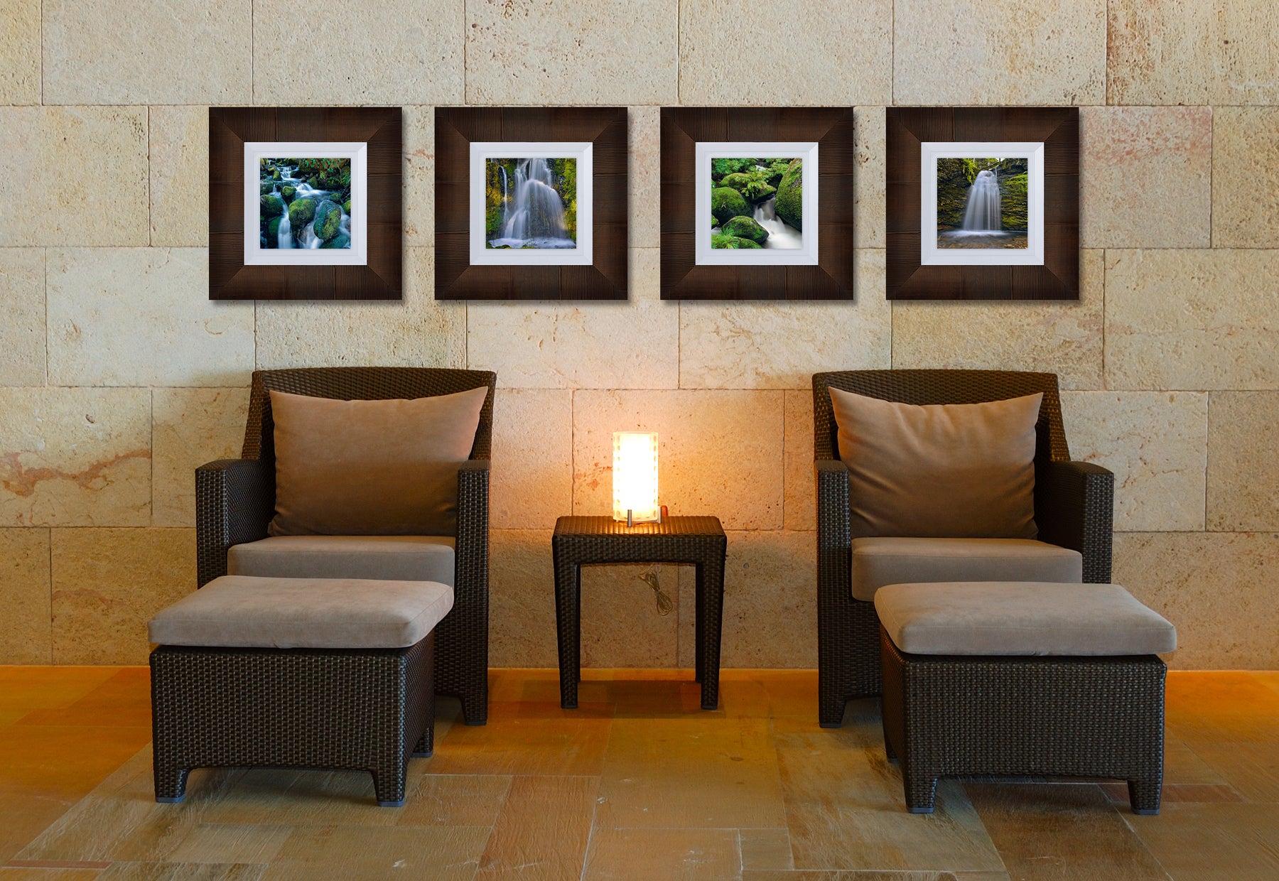 Spa waiting area with two chairs with ottomans featuring four square photographs of waterfalls by Peter Lik in brown frames with with liners
