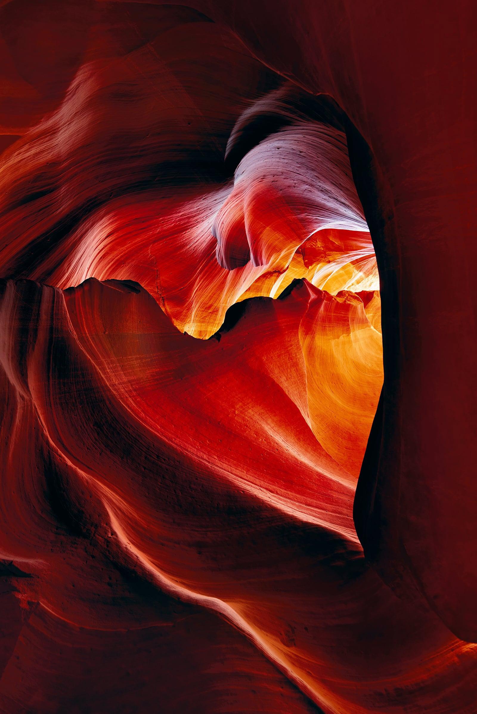 Red and orange heart shaped sandstone cavern within the slot canyons in Antelope Canyon Arizona