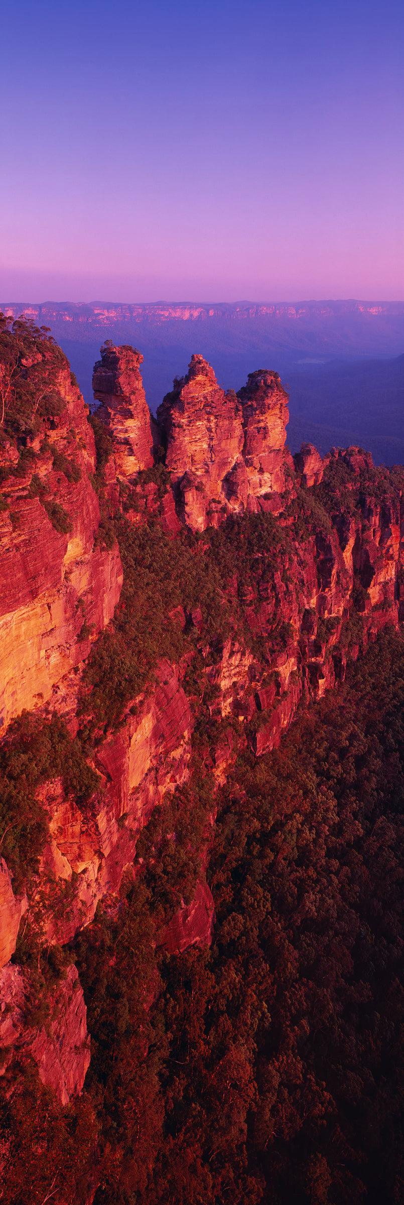 Rocky cliffs covered with trees in the Blue Mountains of New South Wales 