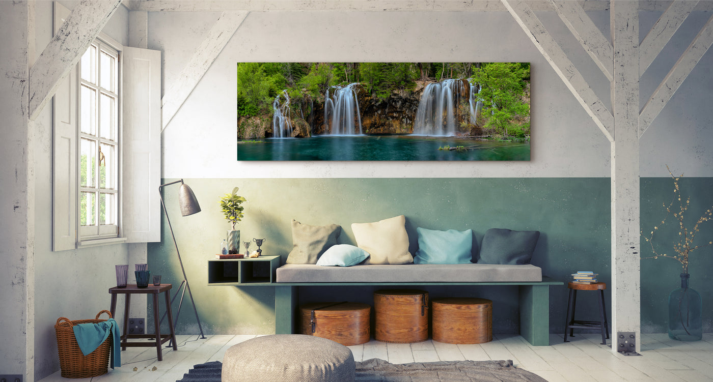 Large Peter Lik photograph of waterfalls hanging on the wall of a country home