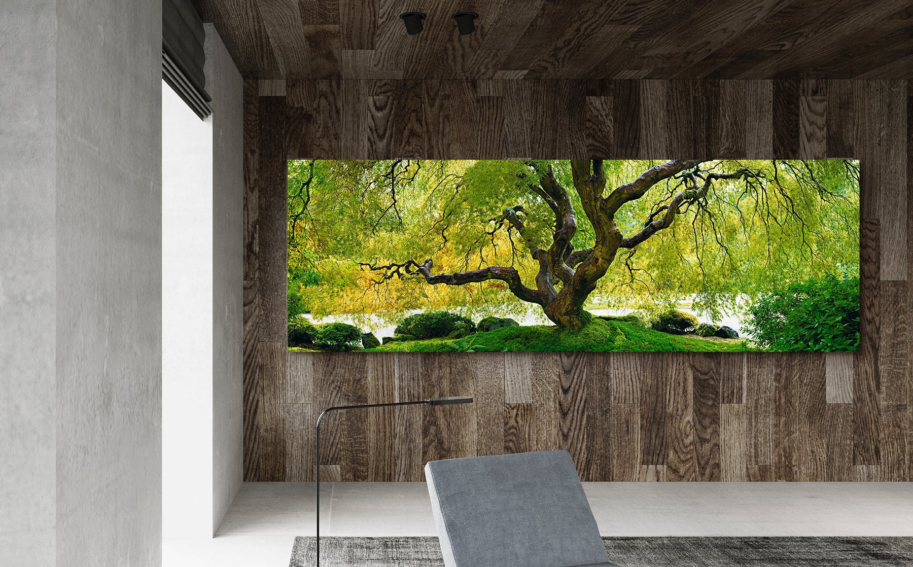 Large Peter Lik photograph of a large tree with green leaves hanging on a wood wall in an urban loft 