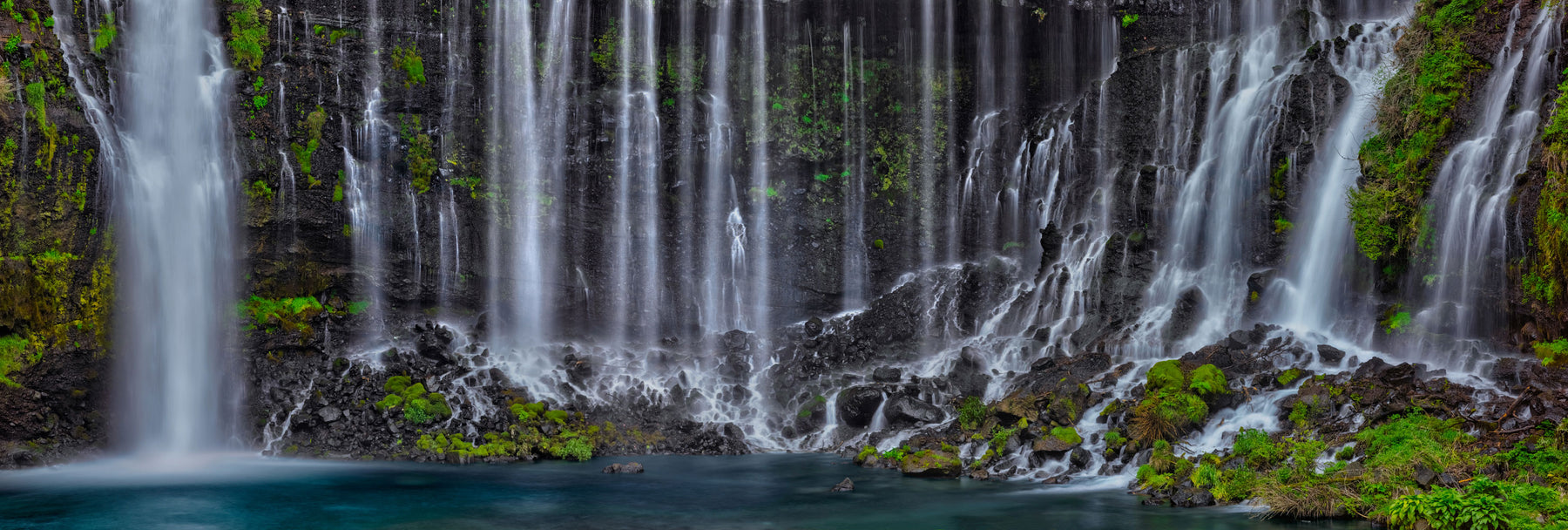 Embark on a journey to Japan's serene Shiraito Falls, where cascading silk-like water offers a tranquil retreat amidst nature's whispers.