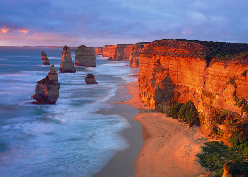 Twelve Apostles by Peter Lik is a landscape photograph of limestone off the shore of Port Cambell National Park, Australia