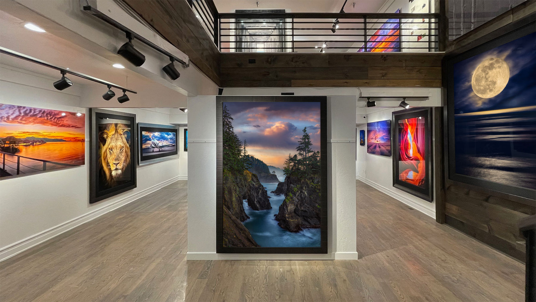 Interior of the Peter Lik Gallery in Park City filled with fine art landscape photos hanging on the white walls.