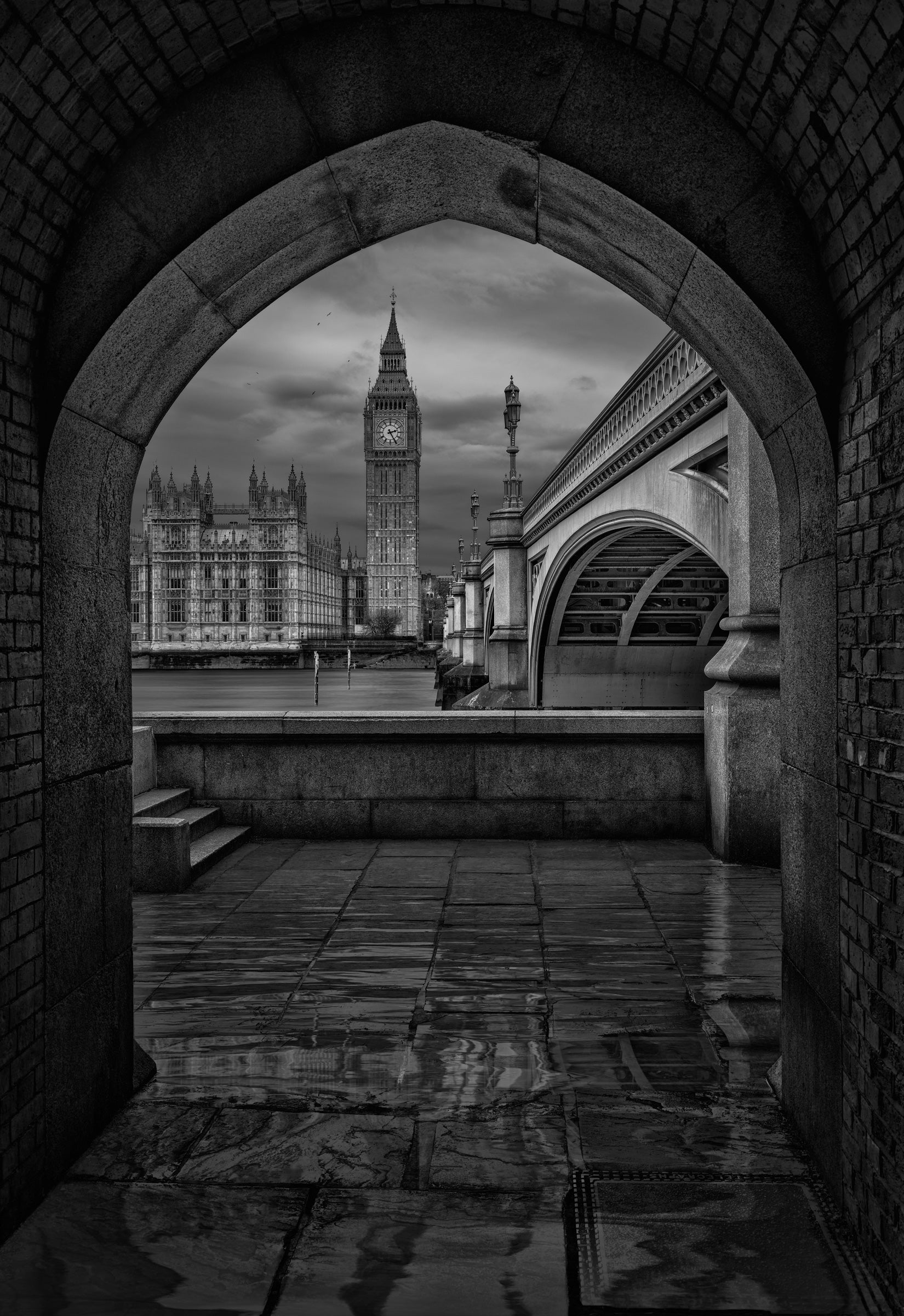 Journey through London’s past with a striking view under timeless arches.