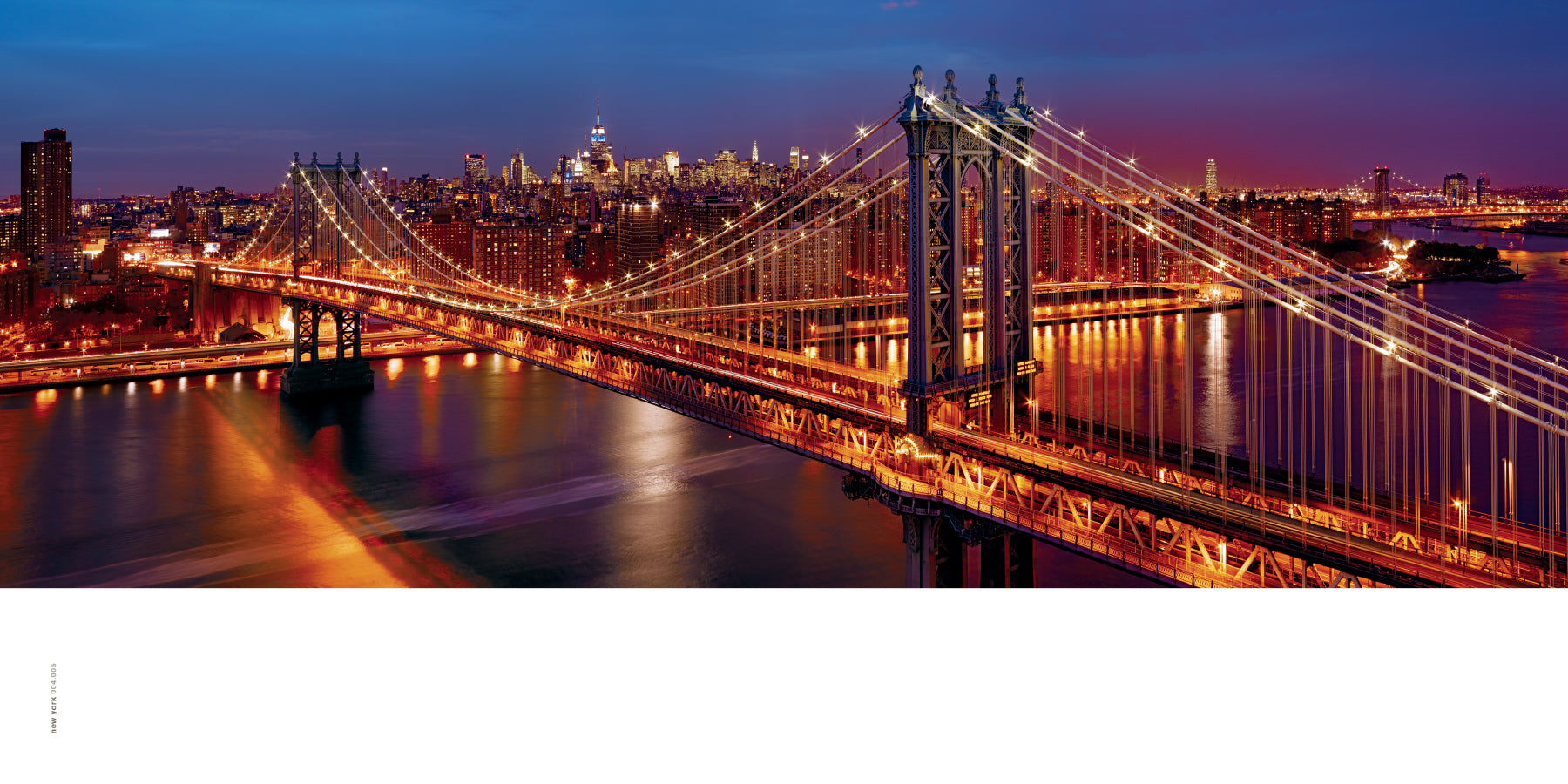 Photo of New York City and bridge after sunset by Peter Lik