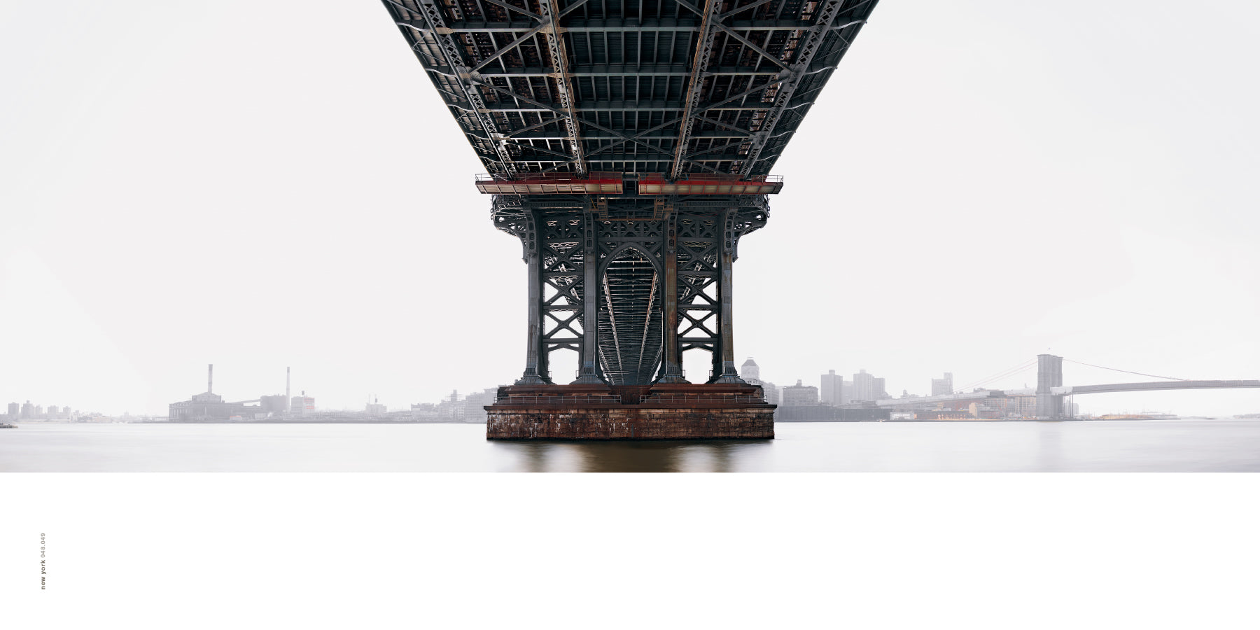 Photo of underside of New York City bridge by Peter Lik