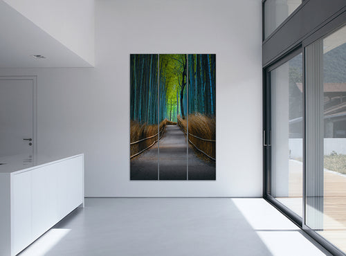 Peter Lik's fine art photograph of a path and trees, Kyoto Dreaming, hanging on the wall of a modern kitchen