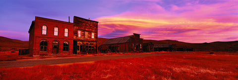 Old buildings in the abandoned ghost town of Bodie California at sunrise