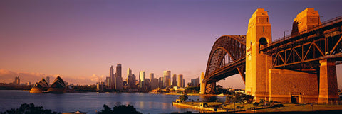 Sydney Harbour Bridge at sunrise with The Opera and city of Sydney Australia in the background