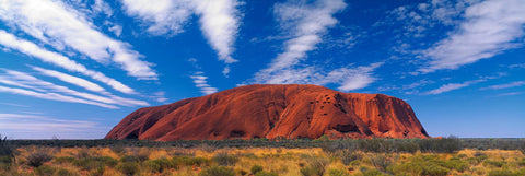 Massive sandstone monolith in the brush covered Northern Territory of Australia