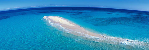 Aerial view of the sandy beach of Upolu Cay surrounded by the turquoise ocean at the Great Barrier Reef Australia