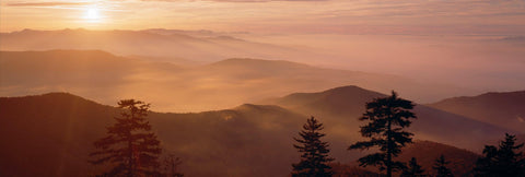 Sun setting over the misty mountain tops of the Great Smoky Mountains National Park Tennessee